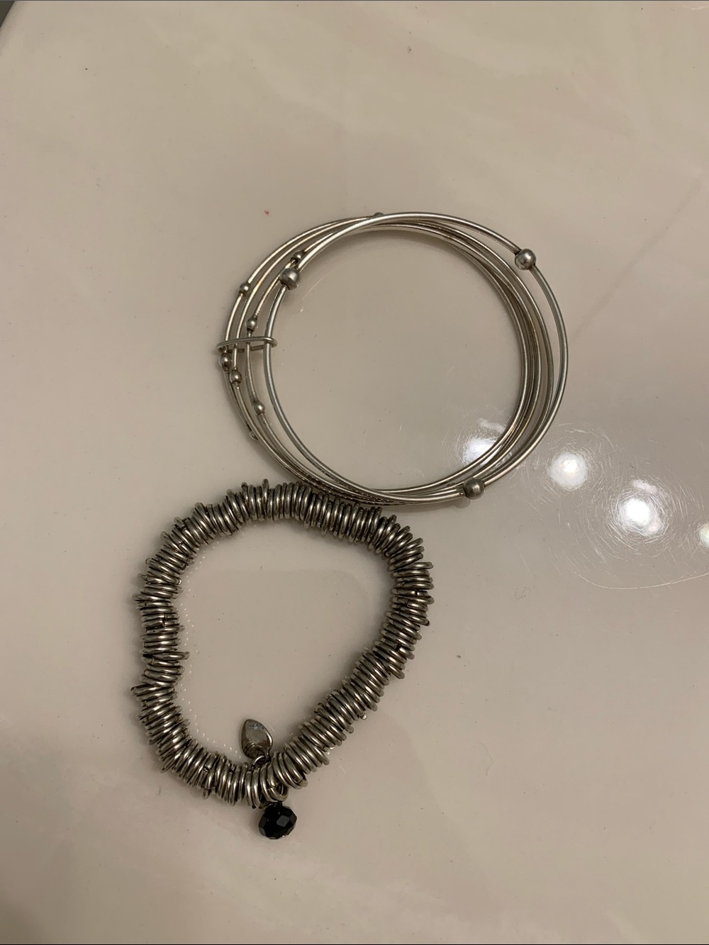 Bracelets , pewter by a local Tofino artist . Good condition, as is